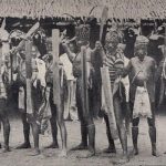 001010 Moluccas, Seram, photograph of men with shields