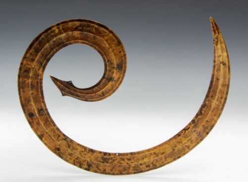 001384 Sulawesi, brass head ornament