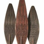 001459 Papua, Cenderawasih Bay, Lake Sentani, three paddles