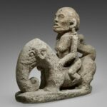 001525 Sumatra, Batak, stone equestrian figure